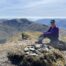 `lay sitting down on the summit of Beinn an Lochan- Walk of the Month April 2026 Argyll Walks'